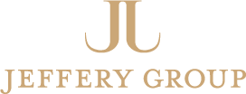 The Jeffery Group monogram and wordmark, in gold