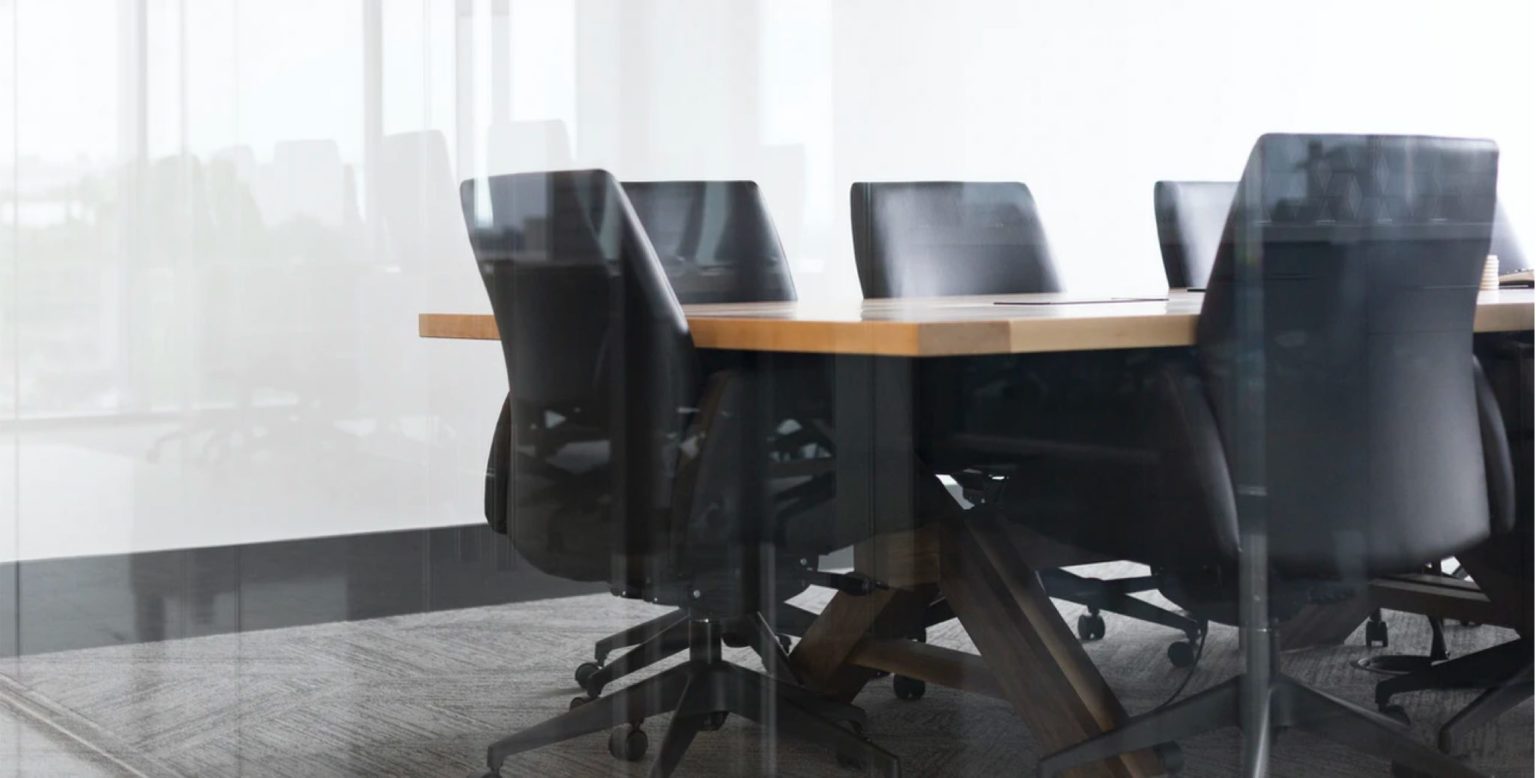 The boardroom photograph from the top of Torontoism’s team page